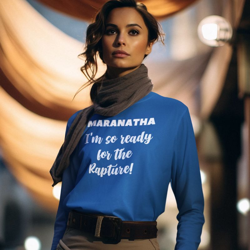 Hispanic woman wearing a blue long sleeve shirt that says &quot;Maranatha: I&