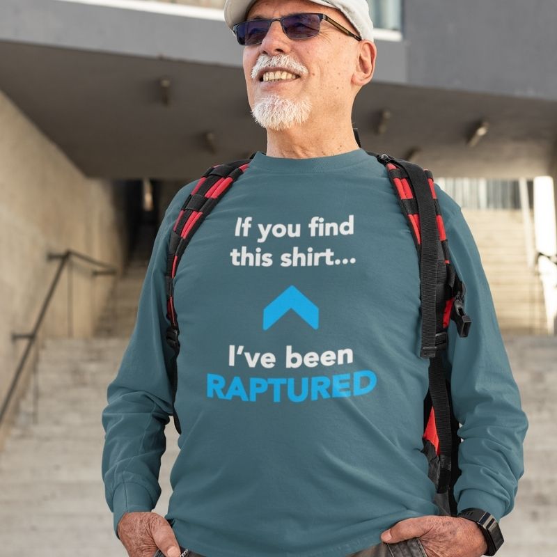 White man wearing teal Christian long-sleeve shirt. There is a big blue arrow pointing upward in the middle of the shirt. Above the arrow, it says &quot;If you find this shirt...&quot; and below, it says &quot;I&