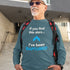 White man wearing teal Christian long-sleeve shirt. There is a big blue arrow pointing upward in the middle of the shirt. Above the arrow, it says "If you find this shirt..." and below, it says "I&