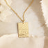 Gold chain necklace with a gold square pendant engraved with "Proverbs 8:28" and some leaves