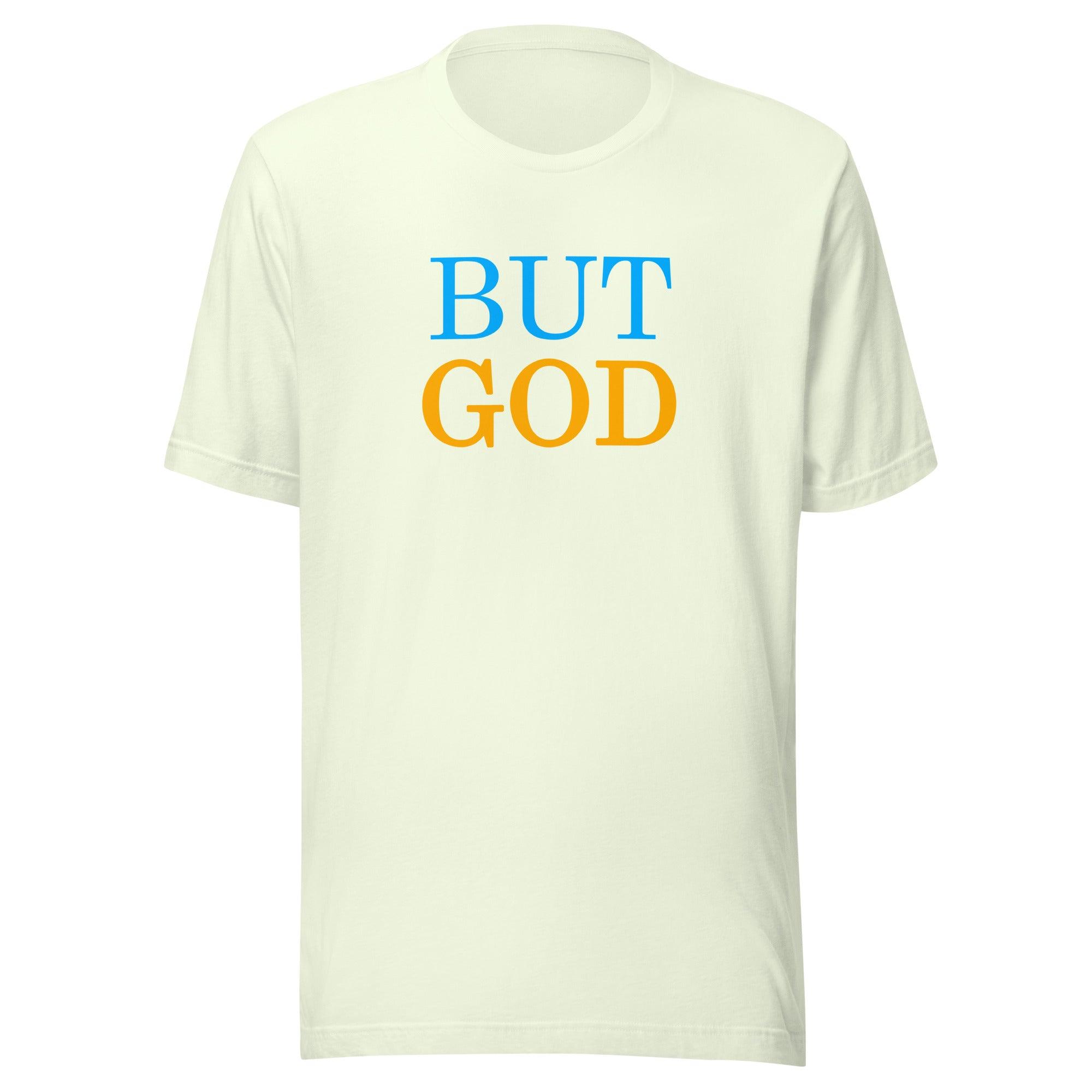 Flatlay of a light yellow Christian t-shirt that says &quot;BUT GOD&quot; in caps lock. 