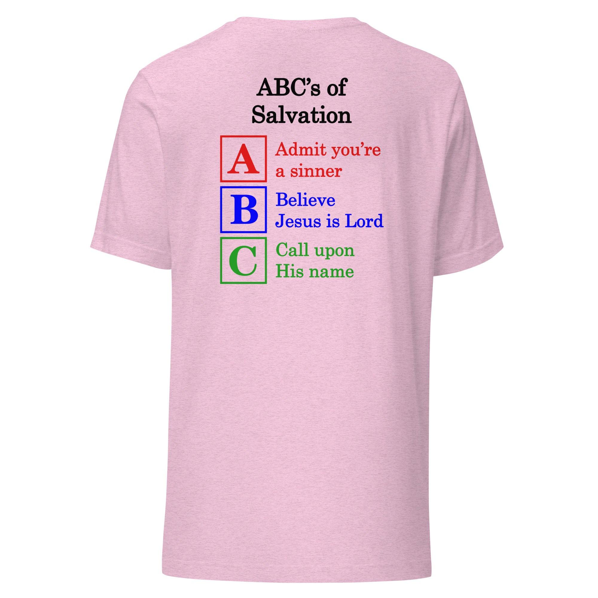 Flatlay of a pink shirt, showcasing a Christian design, that says:
ABC&