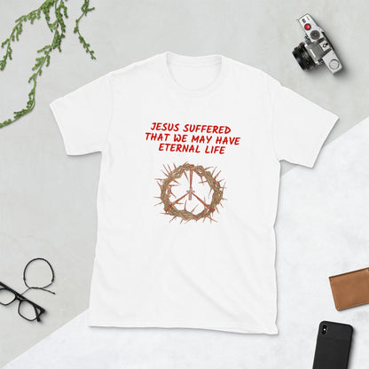 Flatlay of a white Christian t-shirt that says &quot;Jesus suffered that we may have eternal life&quot;.

Below the text, there. is a graphic of a crown of thorns, with a cross in the middle. The crown of thorns was what Jesus wore on his head during the Crucifixion.