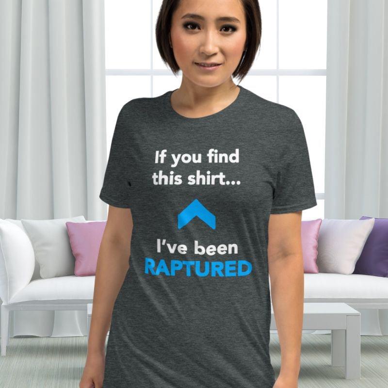 White woman wearing gray Christian unisex t-shirt. There is a big blue arrow pointing upward in the middle of the shirt. Above the arrow, it says &quot;If you find this shirt...&quot; and below, it says &quot;I&